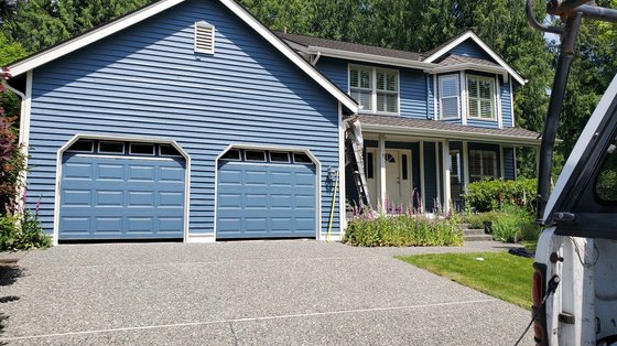 Blue two-story home with crisp white trim