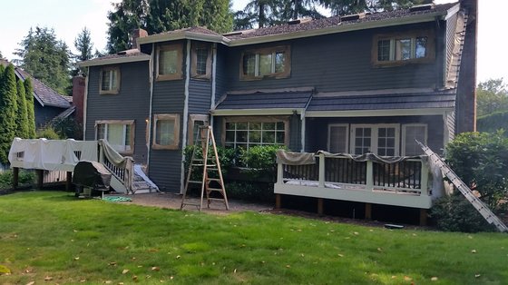 Two-story rear elevation in gray with white trim